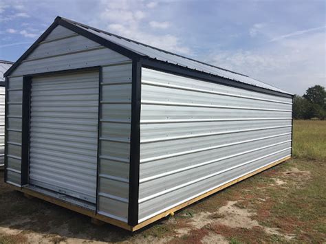 Storage Sheds - Bennett Buildings SUPERSTORE of Lugoff - 320 US 601 - Call 803-572-5652 Pre-Owned - Silver Bullet - 10x16 WIRED Mini Garage - $3700 plus... . 