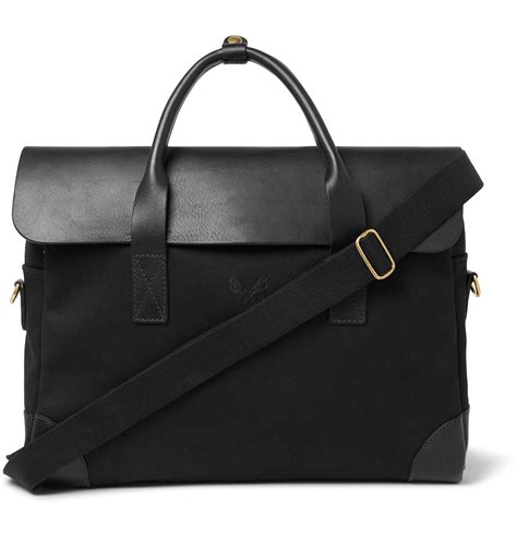 Bennett winch. Weekender, Black. £850.00. From hotels and meeting rooms to airport lounges and weekends away, our designer black holdall comes complete with detachable suit carrier for added convenience. 