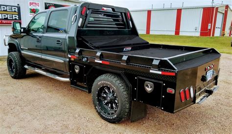 Besler flatbeds. UTILITY FLAT BED. The most versatile black out truck bed on the market today that offers plenty of storage with our weatherproof toolboxes and four flush mount worklights. Available Lengths: 7’ • 8’6” • 9’4” • 11’4”. (5) High intensity LED worklights for a combined 5,000 lumens - 2 on the rear, 2 in the tailgate and 1 cargo ... 