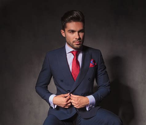 Bespoke suit. Due to the decreased amount of handwork (and thus fewer man-hours put into the suit), custom suits tend to be less expensive than bespoke ones. You can generally expect to pay $1500-$3000 or so for an American-made suit, depending on the fabric you choose and the number of fittings. 