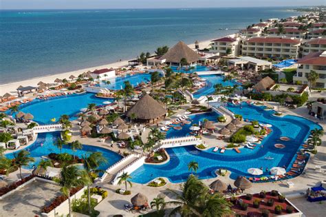 Best all-inclusive resorts in cancun. Moon Palace Cancun is an all-inclusive golf resort on the Riviera Maya in Cancun. Thanks to its massive size, this property often feels like a small town. Here you can find more than 2,000 rooms, an array of dining options, and a long list of amenities that make it a favorite among large groups and families. 4.6. 