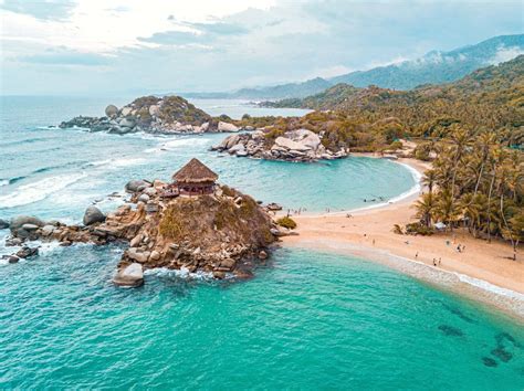 Best beaches in colombia. Sep 28, 2022 · Most romantic beach: Bendita Beach. Tucked under a canopy of trees overlooking crystal clear turquoise waters is Bendita Beach. Also known as Isla Bendita, this private enclave is one of the smallest of the Rosario Islands. In fact, you can walk around the entire thing in 15 minutes. 