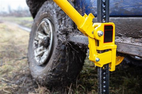 Many trailers have a jack attached to the tongue that is used to lower and raise the trailer hitch onto the vehicle's hitch receiver. This jack is often overlooked, and may sit unu...