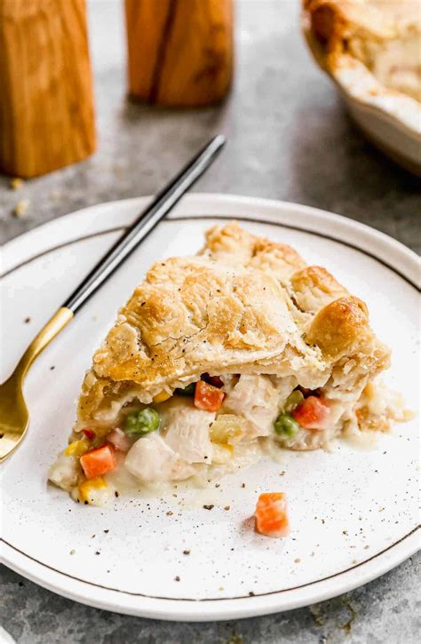 Best frozen chicken pot pie. Heat olive oil in a 3-quart (or large) Dutch oven or ovenproof pot over medium-high heat until shimmering. Add the onion and sauté until tender and lightly browned, 3 to 4 minutes. Add the garlic and cook 1 minute more. Sprinkle in the flour and stir until the flour dissolves. Stir in the chicken broth and milk. 