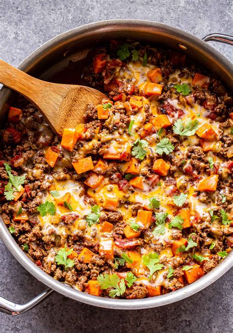Sep 8, 2019 · In a 12" skillet set over medium-high heat add ground beef and yellow onion. Cook the meat until it’s no longer pink and the onions are translucent. Drain any fat. Add in the taco seasoning and prepare according to the packet directions. When the meat is fully cooked stir in the cilantro and remove from the heat. . 