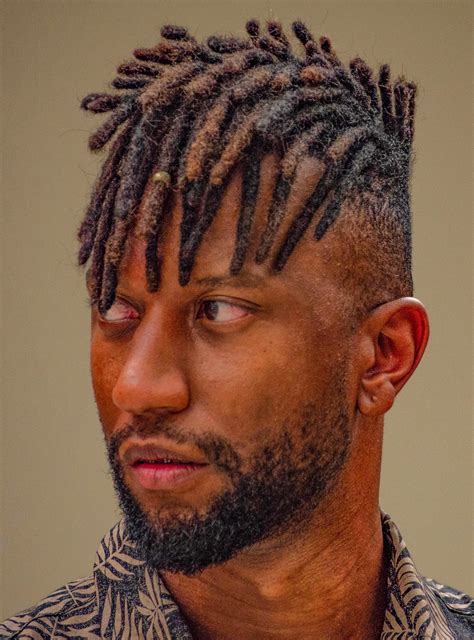 Best haircuts for dreads. Samurai Top Knot With Undercut. Asier Romero/Shutterstock. A clear line of definition separates the shaved short sides and back from the long hair on top in this popular black male hairstyle. Use firm-hold gel to slick the top … 