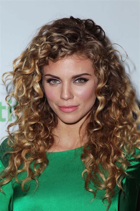 1. Wrap Your Hair in a Silk Scarf. Wrapping curly hair in a 