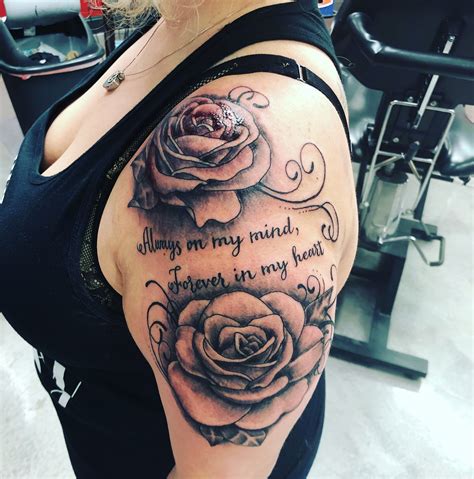 1. Black Rose Tattoo. Roses are often used as signs of romantic love and passion, but when the classic colors are swapped for a darker palette, the meaning usually changes too. Whether they .... 