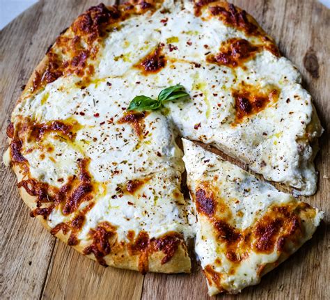 Best mozzarella for pizza. The best mozzarella for a pizza depends on the kind you're making. Most American-style pizzas use low-moisture mozzarella, so that may be the better option for you. That said, pizza heated to a high temperature in a wood-fired pizza oven needs fresh mozzarella instead, which is something to think about. ... 