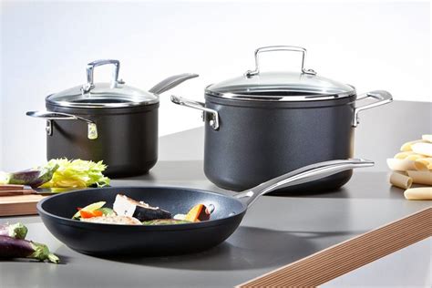 Best non toxic non stick pans. Caraway Nonstick Ceramic Cookware Set (12 Piece) Pots, Pans, 3 Lids and Kitchen Storage - Non Toxic, PTFE & PFOA Free - Oven Safe & Compatible with All Stovetops (Gas, Electric & Induction) - Cream $395.00 
