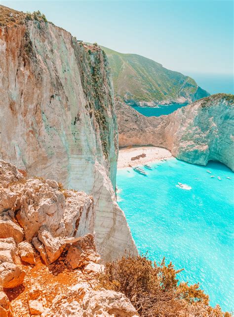 Best place in greece to go. 2. Navagio Beach – Shipwreck Beach. Located on the west coast of Zakynthos, Navagio Beach is a cove surrounded by white sea cliffs that are 900 feet tall. The famous Navagio Beach (Which means shipwreck in Greek) has become the symbol of the island and is one of the top things to do in Zakynthos. 