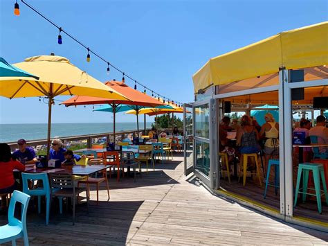 Best restaurants in rehoboth beach. 1. Big Fish Grill Rehoboth. Big Fish Grill is a lively eatery that’s popular for mouthwatering seafood. Try their Special Lobster Pasta, a guest favorite that’s as creamy and delicious … 