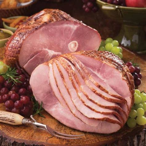 Best spiral ham. Place maple syrup, ginger beer, brown sugar, Dijon mustard, ginger, cloves, and bay leaves in a medium saucepan. Bring to a simmer, whisking occasionally, over medium-high, and simmer until well combined, 2 to 3 minutes. Reduce heat to low, and simmer until thickened and reduced by half, about 20 … 