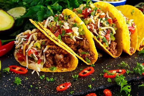 Best tacos. A taco (US: / ˈ t ɑː k oʊ /, UK: / ˈ t æ k oʊ /, Spanish: [ˈ t a k o]) is a traditional Mexican food consisting of a small hand-sized corn-or wheat-based tortilla topped with a filling.The tortilla is then folded around the filling and eaten by hand.A taco can be made with a variety of fillings, including beef, pork, chicken, seafood, beans, vegetables, and cheese, and … 