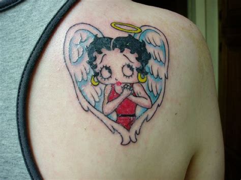 Betty boop tattoos with angel wings. Old School Betty Boop With Angel Wings And Red Roses Tattoo by Ankh1516. Published on June 22, 2016, under Tattoos. Love It 1. Tattoo by :- Ankh1516. ... Betty Boop Tattoo On Lower Back by Zvaki. Outline Betty Boop Tattoo Design by The Shelled One. Tribal Betty Boop Armband Tattoo Design by Twilight Of Fire. Betty Boop Head Tattoo On … 