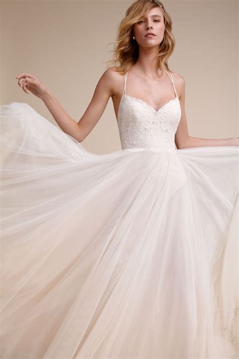 Bhldn wedding dress. Dec 30, 2020 · Quinley Gown. Featuring a structured corset bodice and off-the-shoulder neckline, the Quinley gown is sure to be a crowd pleaser for its entirely unique silhouette. There is beauty top to bottom as you glimpse the tender lace detailing and scalloped hem, and we cannot wait to see it make its debut in garden weddings across 2021. 