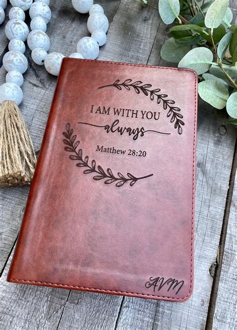 Bible engravers near me. Personalize Bible with a name or image on cover or spine. Bible engraving with foil or by blind debossing. Rule lines and spine bands for customized Bibles. 
