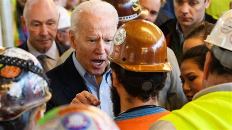 Biden celebrates a labor deal saving an Illinois auto plant as he promotes a worker-centered economy