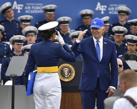 Biden falls on stage during Air Force graduation ceremony
