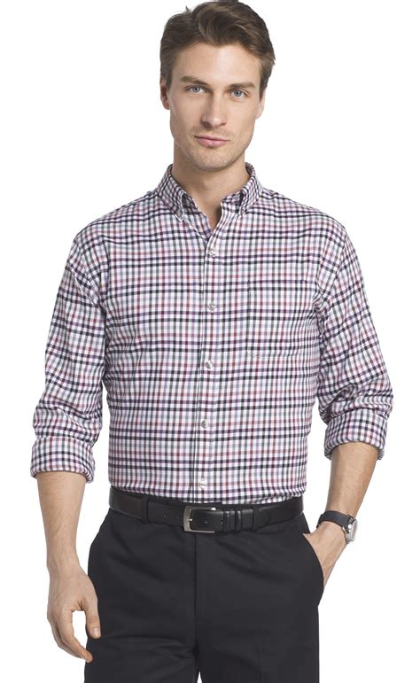 Van Heusen Poplin Short-Sleeve Dress Shirt This poplin dress shirt is designed for convenience, thanks to a wrinkle-free finish that allows you to wear it right out of the dryer. It also features short sleeves and a single pocket for a traditional look that always means business, no matter the season.. 