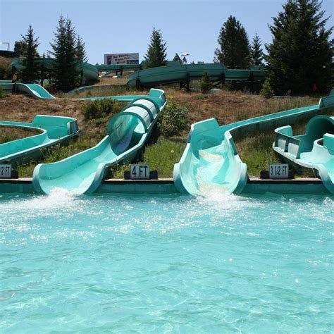 Big sky waterpark. Waterpark Location Big Sky Waterpark is located at 7211 Hwy 2 East, Columbia Falls, Montana. The waterpark is situated in the heart of the Flathead Valley, just 20 minutes away from Glacier National Park. Waterpark Amenities 10 thrilling waterslides A lazy river An activity pool A wave pool A kiddie play area with water features and slides A giant bucket … 