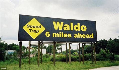 Billboards warning of speed traps in