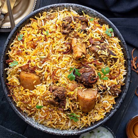 Biriani. Learn how to make a perfect chicken biryani with saffron rice, crispy onions and spices. Follow the step-by-step instructions, tips and variations for this popular Indian dish. 