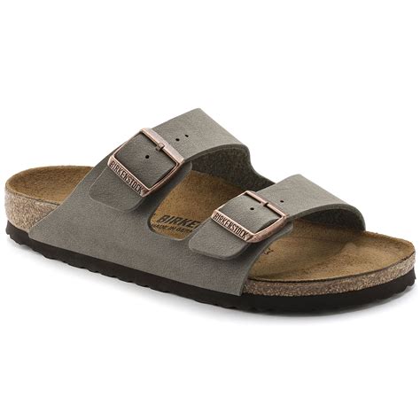 Birkenstock com. The legendary two-strap design from BIRKENSTOCK with amplified buckle accent - the Arizona Big Buckle. The Big Buckle version features a large, elegant buckle creating a bold yet minimalist design. The semi-exquisite footbed is fully lined with soft piumato leather, making it exceptionally comfortable. The upper is made from high-quality ... 