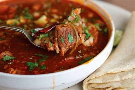 Birria jalisco. Birria de Res, a traditional Mexican dish from Jalisco, is characterized by its slow-cooked, melt-in-your-mouth beef steeped in a rich and flavorful red chile broth. While birria originated as a simple stew using lamb or goat meat, easier-to-find shank, chuck, or short rib is often used in the United States. 
