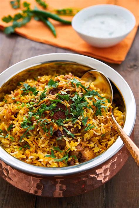 Biryani. Drain the rice, reserving 1 cup of the liquid. In the pot you caramelized the onions in, add the chicken in a single layer, skin-side down. Fry until golden brown on one side (about 5 minutes). … 