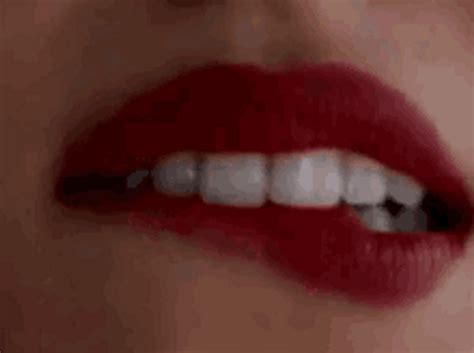 Bites Lip GIFs Tenor