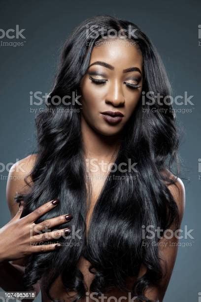 Black Woman With Long Luxurious Shiny Hair Images - Adobe Stock