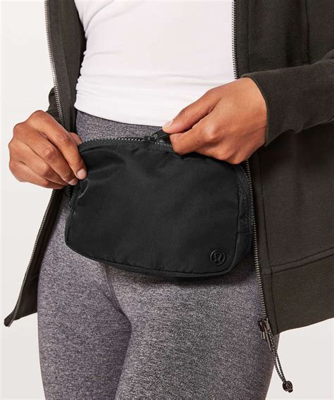 Black lululemon belt bag. Shipping & Returns. Inspired by the look of Lululemon's Wunder Puff outerwear collection, this Wunderfully puffy and quilted Everywhere Belt Bag has space for your phone, keys, and wallet so you can get out the door and on to your next adventure. 