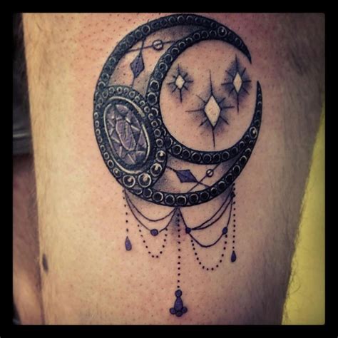 Black moon tattoo. Lilith sigils will look really cool on a tattoo while the astrological sign of Black Moon Lilith comprising a crescent moon and a cross will probably look cuter. If you are a follower of the Wiccan faith, interested in the practice of magic, or merely a pagan, a Black Moon Lilith sign along with a triple moon goddess symbol would look really nice as a “girl power” tattoo. 