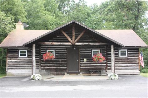 Tomahawk Pines Lodge is a rustic retreat located just 20 minutes away from Penn State University in Philipsburg, PA. With its cozy and comfortable atmosphere, this lodge offers the perfect getaway for those looking to relax, play games, and enjoy the warmth of an open fireplace.