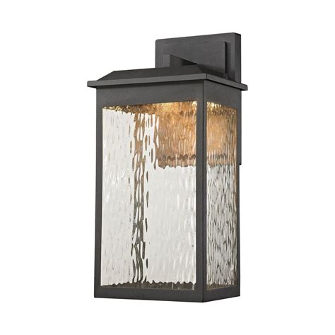 Jefferson 2-Light 25.7 in. Black Large Outdoor Wall Lantern Sconce Light Illuminate your front door or garage with this 2-light outdoor classic new traditional Exterior lantern lighting fixture. It's rated wet locations and its sleek frame is made from metal in a matte black finish that complements your decor classic to rustic.