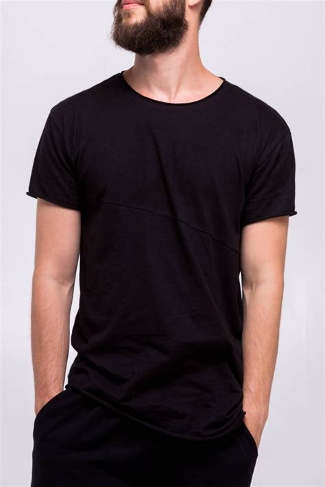 Black shirt t-shirt. The founders of Ministry of Supply (MoS) have created a high-end dress shirt from the same materials that NASA uses in US spacesuits to regulate body temperature. The founders of M... 