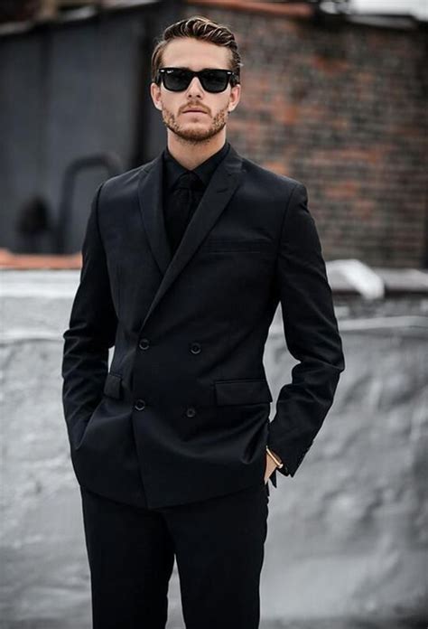 Black suit and black shirt. The black shirt is also usually it's not presented with a good outfit here. It's usually also with a (poorly fitting) black suit, which means you're swimming in a sea of black like an undertaker. Add to it a bright neon or white tie like people … 