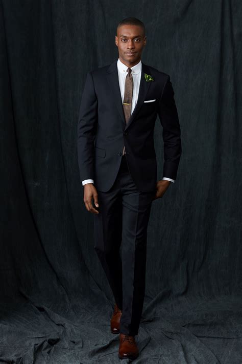 Black suit with brown shoes. Browns shoes have always been a staple in every fashion-conscious individual’s wardrobe. They are not only functional, but also add a touch of style to any outfit. As we approach t... 