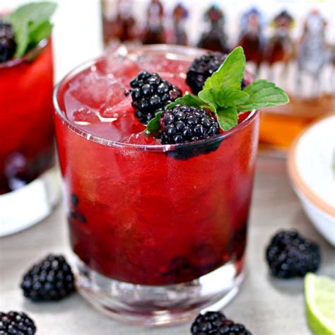 Blackberry cocktail. Absolut Vodka, Lime Juice, Ginger Beer, Lime. Create the perfect Blackberry Martini with this step-by-step guide. Fill a mixing glass with ice cubes. Add all ingredients. Stir and strain into a cocktail glass. 