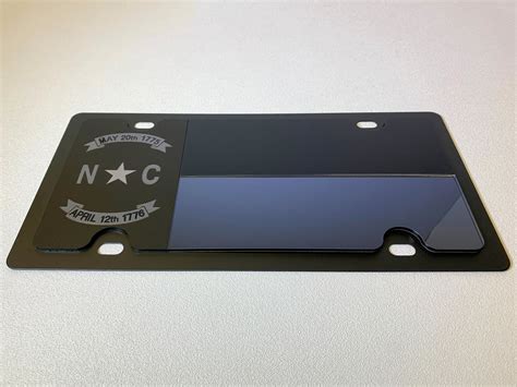 Blackout license plate. The digital plates come in two models: battery-powered and wired. Unlike regular metal plates, in which registration is paid for upfront for either one or two years, drivers can choose to pay for ... 