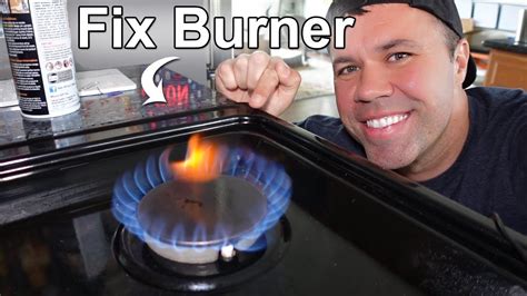 Secondly, open the lid and turn on the propane tank valve. Turn on the burner by turning the control knob to the left until you hear a clicking sound. Hold a long lighter or grill lighter up to the burner and press the trigger to ignite the flame. Keep the lighter in place until the burner stays lit on its own.. 