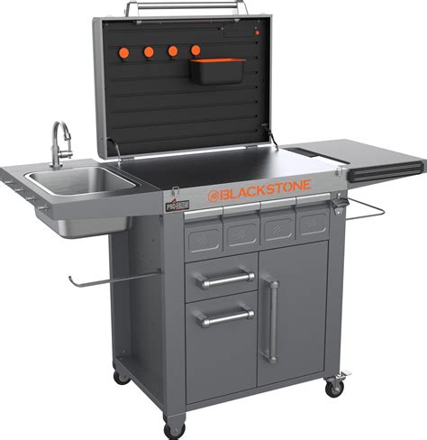 Blackstone pro series prep cart. Blackstone's Pro-Series Prep cart is a stainless steel prep surface and comes with a handy bottle opener and a large drainable ice drawer. Keep everything in reach with a magnetic tool strip, collapsible side shelves, and a removable sink, and do it all at night with a built-in light. 