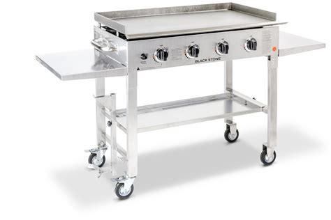 1350-watt motor. 304-gauge stainless steel construction. Electroplated brass embellishments. Lift and lock side tables. (Extra 1500 sq inches of preparation space) Design-driven elevated caster wheels. Extra-large storage drawer. New waste bin attachment system. 36" high-efficiency Omnivore griddle.