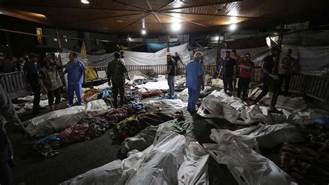 Blast kills hundreds at Gaza hospital; Hamas and Israel trade blame, as Biden heads to Mideast