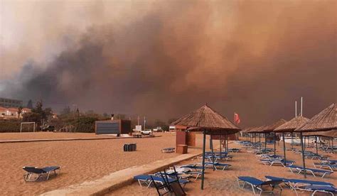 Blaze rages out of control on Greek island of Rhodes, forcing evacuations including from 2 resorts
