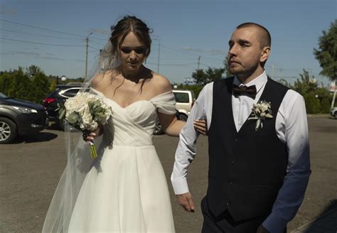 Blinded by a Russian shell, a Ukrainian soldier couldn’t see his wedding. But he cried at new love