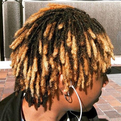 2. Side Tousled. Instagram/ thabangthabskhatide. African-American men who want to keep it low-maintenance can buzz their sides to expose the skin with a significantly longer top that is knitted into medium-sized dreads. The tips are dyed in a blonde hue with all the strands are tousled on one side. 3.. 