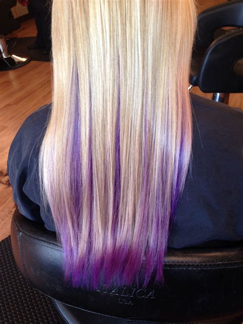 Blonde and purple hair underneath. Here are 4 options: 1. Blonde underlights. Blond is a uniform shade and both retain the brown color on top, making a high contrast impression on the hair. 2. Localized underlights. The color goes in a couple of highlights under the hair, not the entire middle layer. It's great for adding subtle and vibrant touches. 