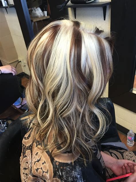 Blonde chunky highlights on dark hair. Create a multi-dimensional allure by choosing two different tones of blonde to be used as highlights on brown tresses. The result is a mix of light, medium and dark strands that will surely drop some jaws when left loose to sway with the wind. 2. Caramel Drizzle. 